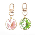 Gold Tone Round Pressed Daisy Resin Clip Keychains view 5
