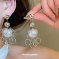 Silver Tone Pearl and Open Ring Fringe Stud Earrings view 1
