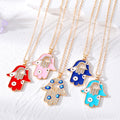 Gold Tone Crystal Open Hamsa Evil Eye Pendant Necklaces in Five Styles view 1