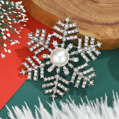 Front view of the pearl snowflake brooch
