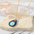 Gold Tone Layered Navy and Aqua Evil Eye Teardrop Earrings view 4