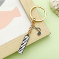 Guitar, Piano and Music Note Charm Keychains Featuring Piano Keyboard Across 17 Variations view 3