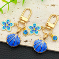 Three Color Blue Pink Shell Flower Metal Clasp Keychain Set view 2