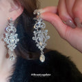 Silver Tone Ornate Openwork Crystal Teardrop Earrings view 1