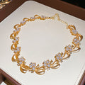 Gold Pearl Bow Ribbon Necklace Matching Stud Earrings view 6
