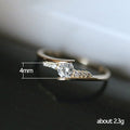Gold Crossed Band Clear Center Stone Ring Metal Alloy view 5