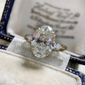 Large Oval Solitaire Three-Stone Ring In Polished Gold Tone view 2