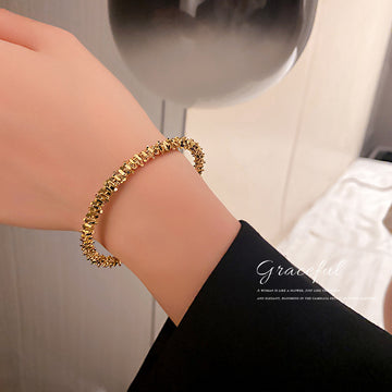 Gold Tone Textured Open Cuff With Angled Clear Stones