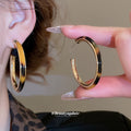 Tortoiseshell Accent Double Hoop Earrings in Gold Tone view 3