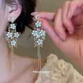 Blue Floral Butterfly Tassel Earrings in Two Tones view 4