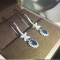 Silver Tone Blue Teardrop Crystal Bow Drop Earrings view 3