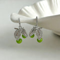 Silver Tone Crystal Leaf and Green Cherry Drop Earrings view 1