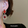 Red Oval Gem and Gold Tone Filigree Drop Stud Earrings view 4