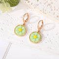 Gold Tone Round Daisy Resin Huggie Drop Earrings in Six Colors view 2