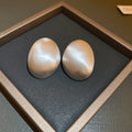 Brushed Oval Statement Stud Earrings in Gold and Silver Tones view 2