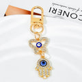 Gold-Tone Rhinestone Hamsa Hand Keychain With Evil Eye Charm view 5