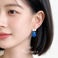 White Bow Blue Glass Flower Drop Earrings Red Centers view 2