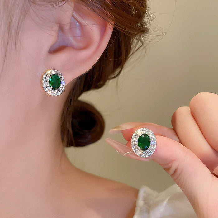 Green Oval Crystal Stud Earrings with Silver Tone Border