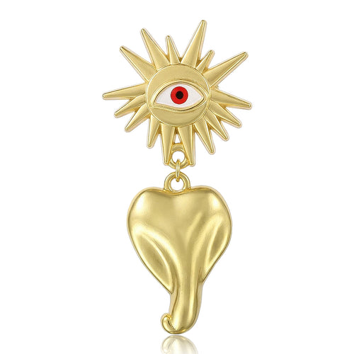 Gold Tone Sun Eye brooch With Red Eye And Heart Drop shown in front view on a light background