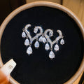 Crystal Scroll Drop Earrings in Gold and Silver Tone Options view 6