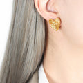 Gold Steel Nested Ribbed Heart Stud Earrings Metal view 7
