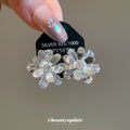 Clear Iridescent Floral Crystal Stud Earrings with Crystal Accents view 1