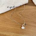 Silver Tone Coastal Pendant Necklaces with Shell and Starfish Charms view 6