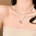 Coastal Charm Necklaces with Shells Stars Pearls and Blue Beads view 2