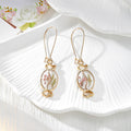 Gold Tone Candy-Shaped Pressed Flower Drop Earrings in Six Designs view 4