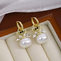 Gold Tone Swan Crystal Look Pearl Look Huggie Earrings view 3