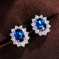 Oval Floral Halo Stud Earrings In Seven Center Colors view 3