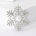 Pearl Snowflake Brooch in Metal with Geometric Crystal Snowflake Centered by a White Pearl view 6
