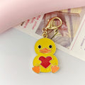 Yellow Heart-Holding Duck Lobster-Clasp Charm with Gold Tone Finish view 6