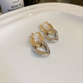 Two Tone Interlocking Oval Huggie Hoop Polished Metal Polished Metal Earrings view 6