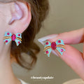 Multicolor Crystal Bow Stud Earrings With Pink Centers view 1