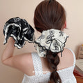 Ivory Black Floral Print Oversized Bow Scrunchie With Lace Edge view 1