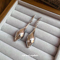 Sculpted Teardrop Stud Earrings in Gold and Silver Tones view 4