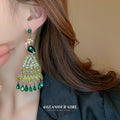 Green Crystal Peacock Chandelier Drop Earrings with Polished Metal Accents view 4