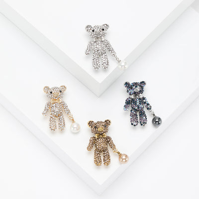 Front product view of the crystal teddy bear brooch on a light background