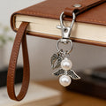 Silver Angel Wing and Pearl Lobster Clasp Charm and Attached Hardware view 3