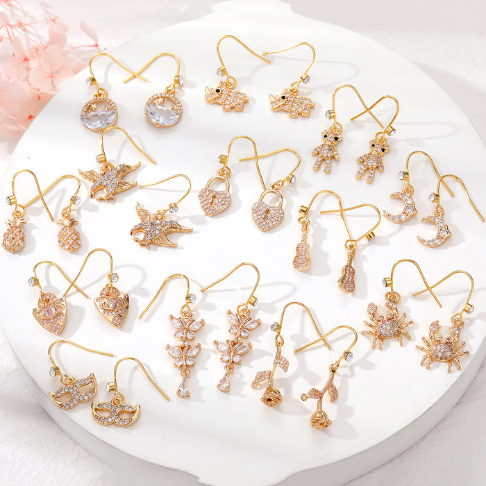 Gold Tone Crystal Animal and Symbol Hook Earrings in Thirteen Designs