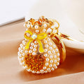 Pearl Heart Fortune Pouch Keychains in Eight Pictured Enamel Colors view 9