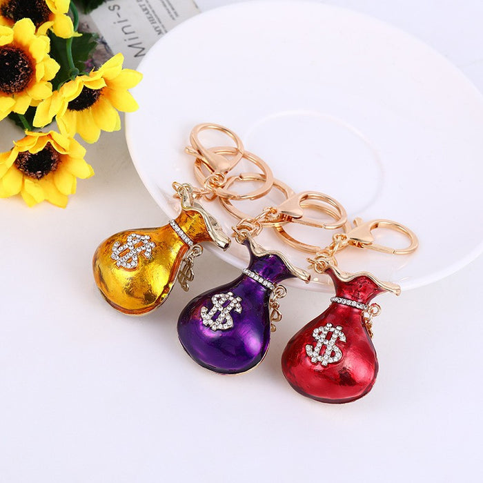 Rhinestone Dollar Money Bag Keychain Gold Purple Red