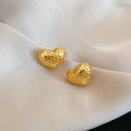 Textured Heart Stud Earrings With Polished Metal Tone Details view 6