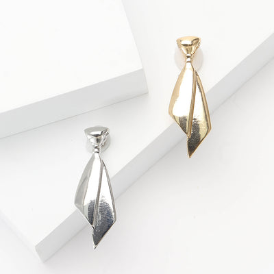 Front view of polished necktie brooch with folded metal shape decorative metal pin