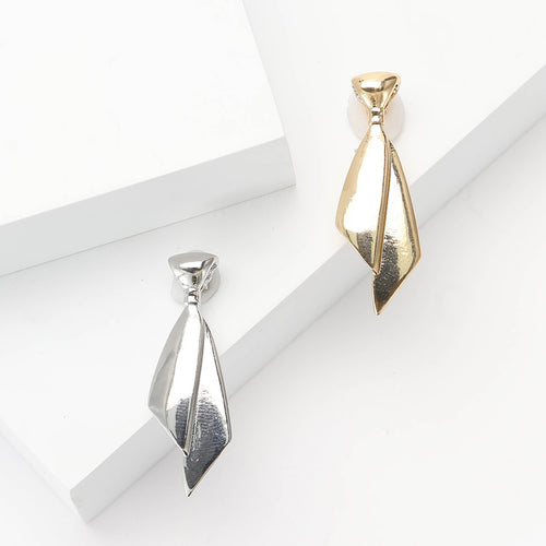 Front view of polished necktie brooch with folded metal shape decorative metal pin