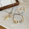 Peach Rabbit Charm Ring Necklace Bracelet and Earring Set view 1