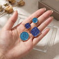 Blue and Cream Swirl Geometric Mismatched Stud Earrings view 1