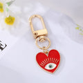 Gold Tone Colorful Enamel Heart Eye and Rainbow Clip Keychains view 2