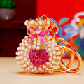 Pearl-Covered Pouch Keychains with Heart Crystals in Eight Colors view 11
